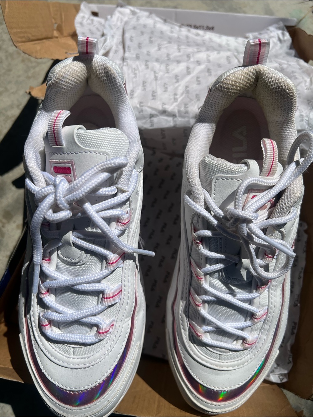 Fila White Sneakers with Pink Accents and Iridescent Trim